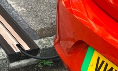 electric vehicle cross-pavement charging channel