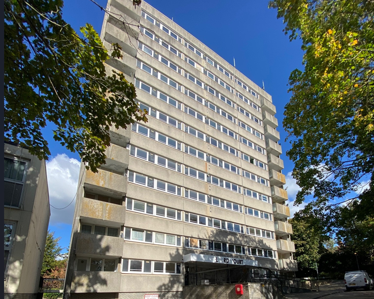 A tall building with many windows
AI-generated content may be incorrect.