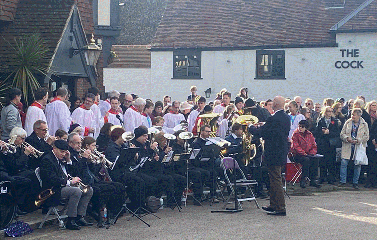 A group of people playing instruments

AI-generated content may be incorrect.